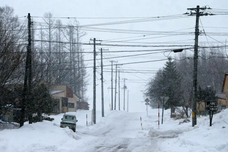 Historic bomb cyclone blizzard buries the US Northeast as power outages persist, flights are canceled, and more snow falls