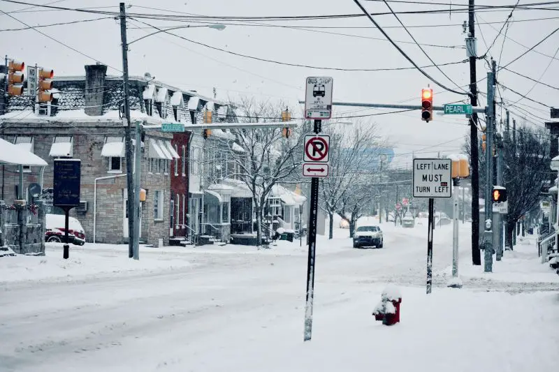 Historic bomb cyclone blizzard grips the US Northeast with record snowfall, prolonged power outages, and fresh snow during the cleanup