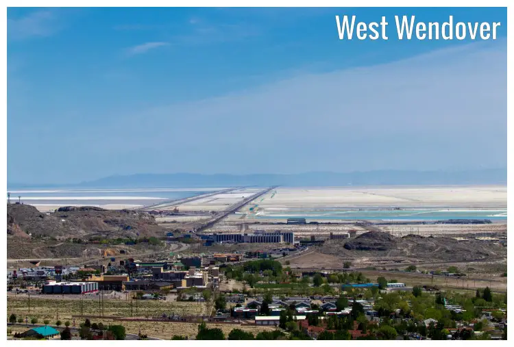 A dramatic landscape engulfing the scenic West Wendover town in Nevada, with a clear far view of the iconic Bonneville Salt Flats