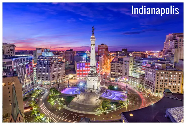 The magnificent Monument Circle in Indianapolis, Indiana with the surrounding cityscape