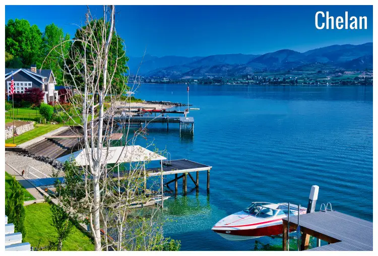 A small beachside condo over the deep blue sea, deep blue sky, and the deep blue hills afar, in Chelan, Washington