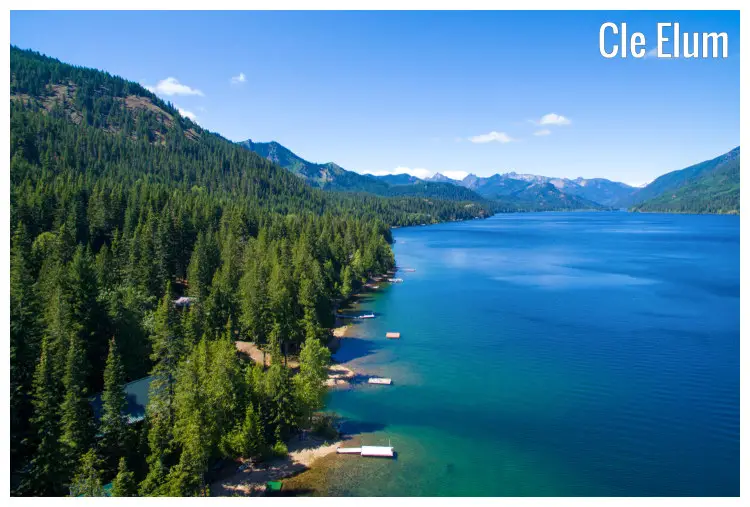The deep blue lake surrounded by a scenic layout of high hills and deep forestry in Cle Elum, Washington