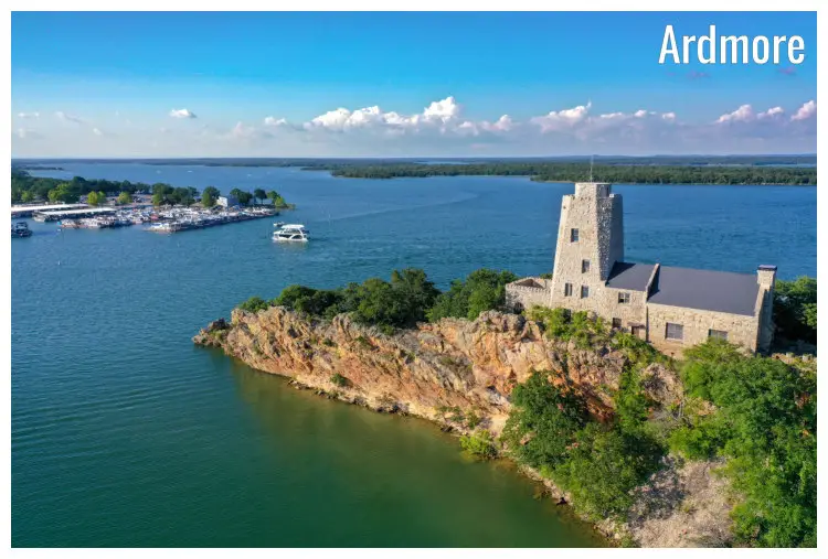 The large Tucker Tower overlooking the calm blue water of Lake Murray in Ardmore, Oklahoma The large Tucker Tower overlooking the calm blue water of Lake Murray in Ardmore, Oklahoma