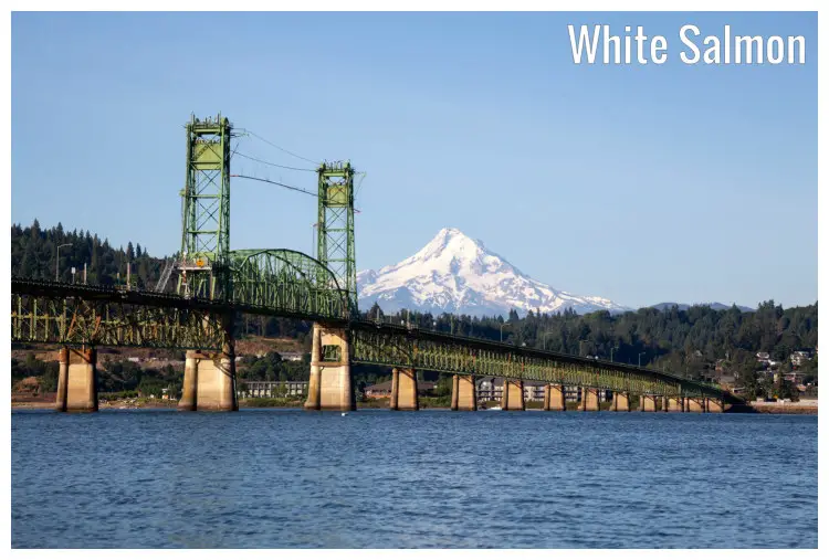 The iconic Hood River Bridge over the Columbia River in White Salmon, Washington, with Mt Hood The iconic Hood River Bridge over the Columbia River in White Salmon, Washington, with Mt Hood
