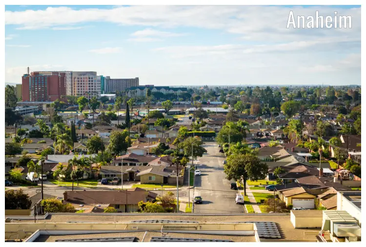 Beautiful residential area in Anaheim, California with a tall flat building in a distance