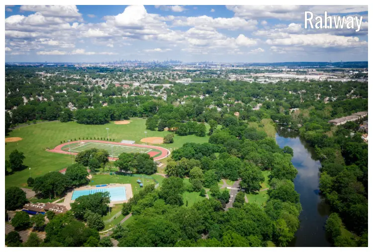 A river and dense forestry scene near a swimming pool and playfield in Rahway City, New Jersey