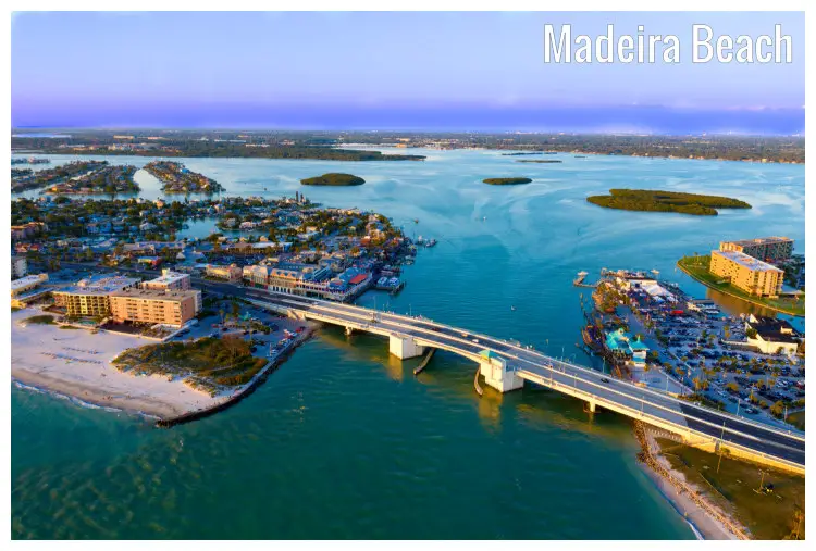 Madeira Beach in Florida and a full scenic view of the iconic John Pass Village and the connecting boardwalk freeway roads Madeira Beach in Florida and a full scenic view of the iconic John Pass Village and the connecting boardwalk freeway roads