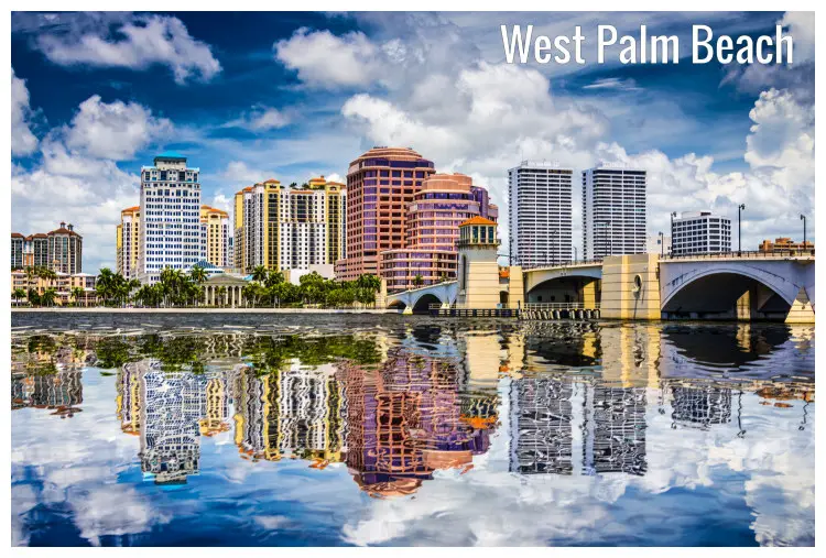 Tall, beautiful buildings reflected in the waterway in West Palm Beach, Florida Tall, beautiful buildings reflected in the waterway in West Palm Beach, Florida