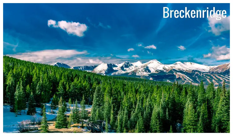 The hilly forest slopes overlooking the vast mountain ranges of Breckenridge in Colorado The hilly forest slopes overlooking the vast mountain ranges of Breckenridge in Colorado