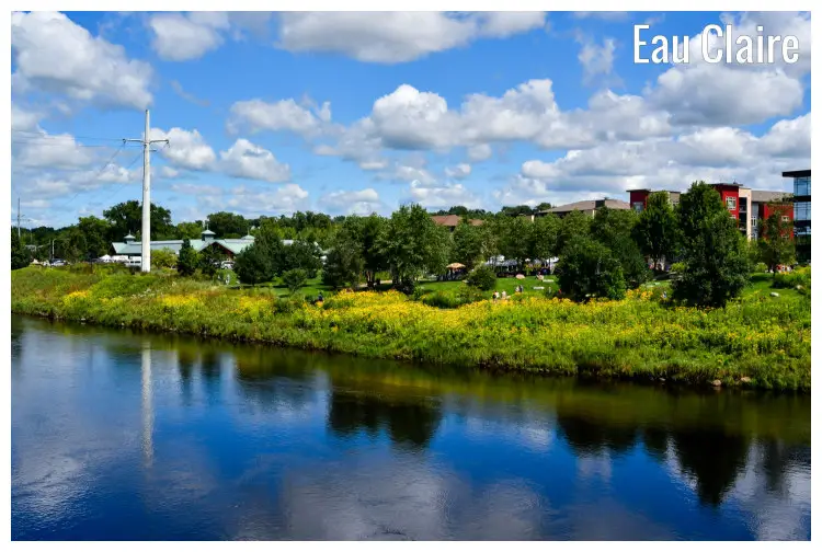 From across Chippewa River in Eau Claire, Wisconsin, is the scenic Phoenix Park and a partial view of the farmers