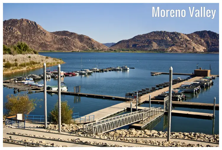 Marina on Lake Perris State Park in Moreno Valley, California, with visible piers, luxury boats, and high hills
