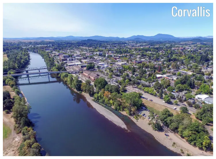 A large river with two bridges across it in the city of Corvalis, Oregon, home to the famed Oregon State University