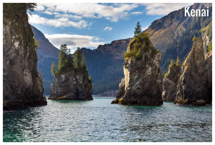 High rock cliffs of the scenic Spire Cove in Fjords National Park in Kenai, Alaska High rock cliffs of the scenic Spire Cove in Fjords National Park in Kenai, Alaska