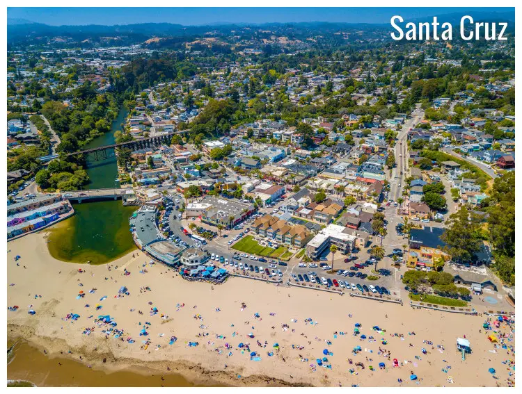 Sandy beach, scenic trees, and residential homes of the bay area in Santa Cruz, California