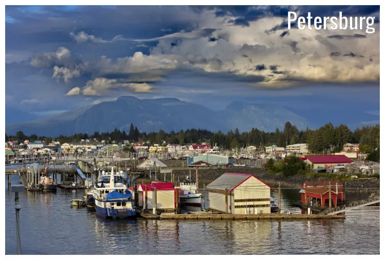 Colorful buildings, docked ships in Quaint fishing village in Petersburg, Alaska, on Mitkof Island Colorful buildings, docked ships in Quaint fishing village in Petersburg, Alaska, on Mitkof Island