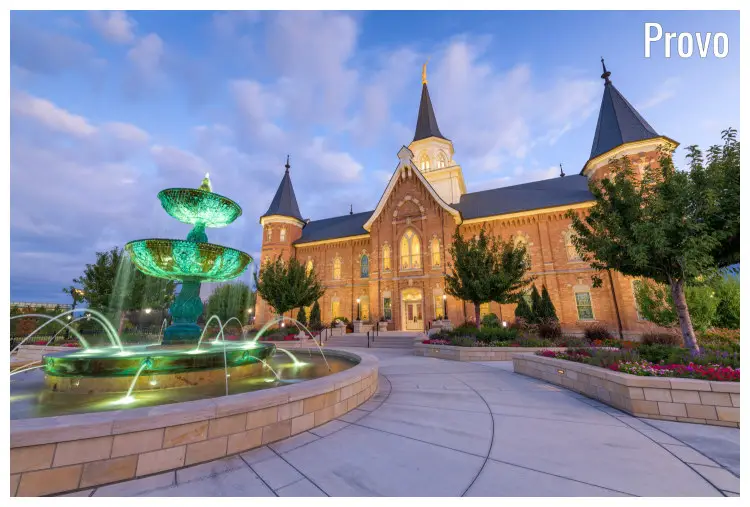 A clear paved path leads up to the City Centre Temple in the town of Provo, Utah