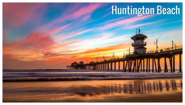 The beautiful Huntington Beach, California, with a view of the pier and houses The beautiful Huntington Beach, California, with a view of the pier and houses