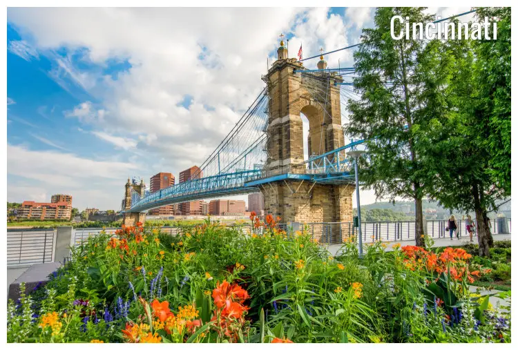 A beautiful park in spring next to the John A Roebling suspension bridge in Cincinnati, Ohio A beautiful park in spring next to the John A Roebling suspension bridge in Cincinnati, Ohio