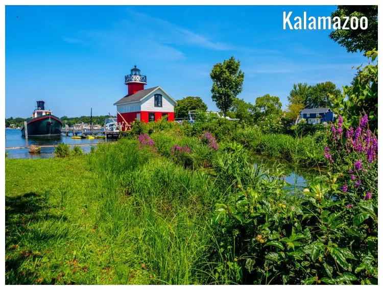 A beautiful bank on river Kalamazoo in Michigan, with a view of a ship and the Douglas Lighthouse
