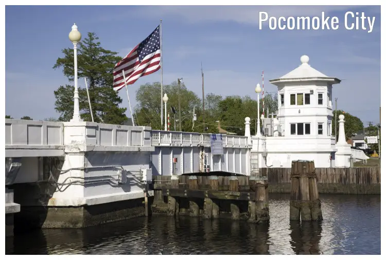 The white stone bridge and a white house over a river in Pocomoke City, Maryland