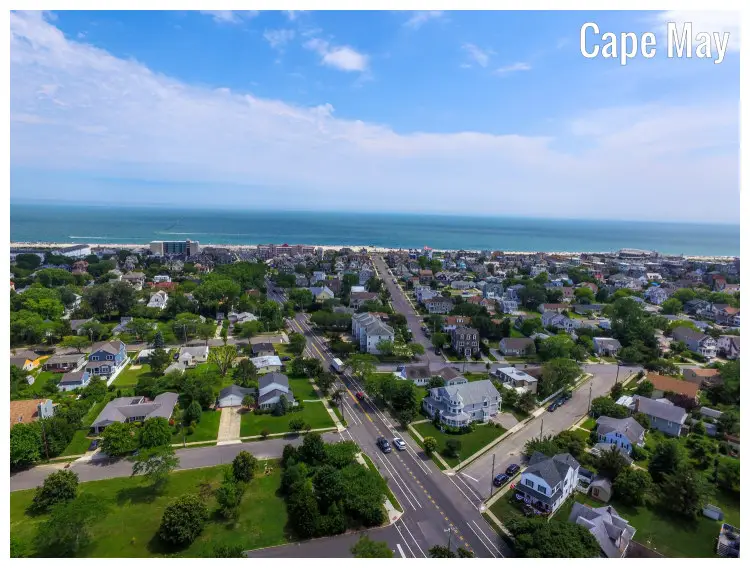The superior design on the city of Cape May, New Jersey, with deep road veins and city buildings near the vast, blue sea in a far view The superior design on the city of Cape May, New Jersey, with deep road veins and city buildings near the vast, blue sea in a far view