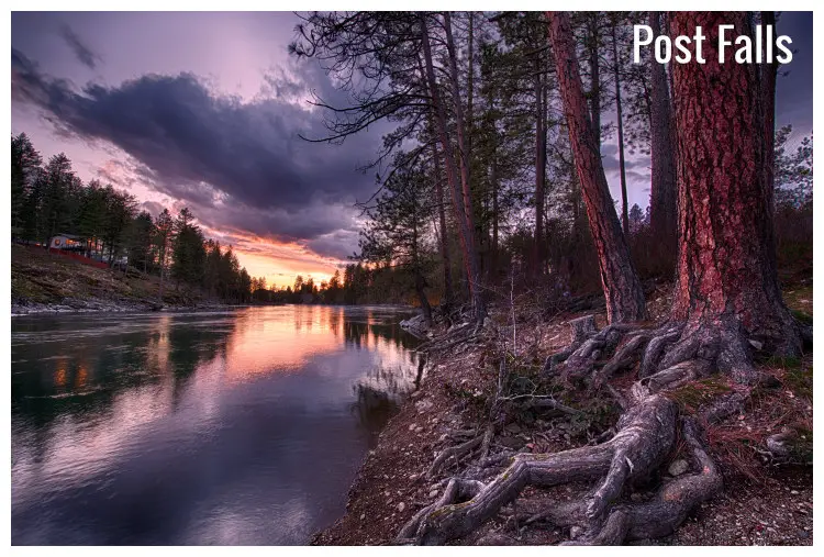 Corbin Park on the banks of the Spokane River flowing downstream in Post Falls, Idaho, USA