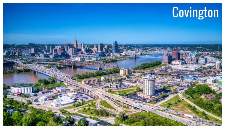 Covington City, Kentucky as well as the city of Cincinnati, with three large bridges over the river Covington City, Kentucky as well as the city of Cincinnati, with three large bridges over the river