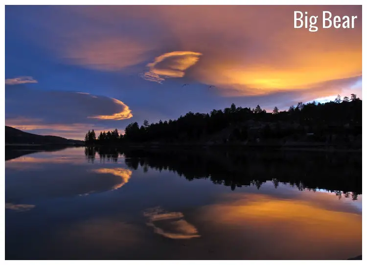 Aa reflection of the colorful sunset sky in the calm lake waters at Big Bear Lake, California Aa reflection of the colorful sunset sky in the calm lake waters at Big Bear Lake, California