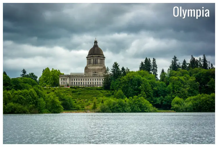 The calm Capitol Lake overlooking the Washington State Capitol building in Olympia, Washington The calm Capitol Lake overlooking the Washington State Capitol building in Olympia, Washington