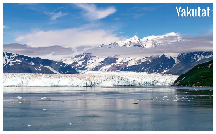 A beautiful panorama of the famous St Elias Mountain covered in snow and clouds, with a view of the Hubbard Glacier, Yakutat, Alaska A beautiful panorama of the famous St Elias Mountain covered in snow and clouds, with a view of the Hubbard Glacier, Yakutat, Alaska
