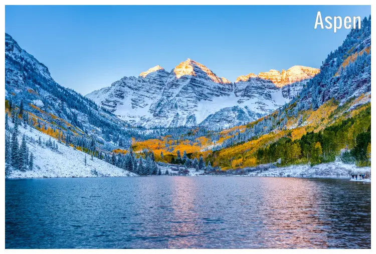 The icy Maroon Bells in the Elk Mountains viewed from the White River below The icy Maroon Bells in the Elk Mountains viewed from the White River below