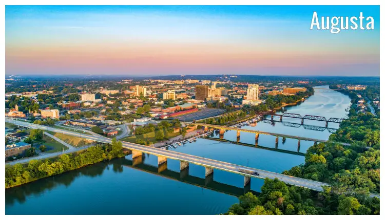 The stunning city of Augusta, Georgia, three bridges and road veins, under the colorful sunset sky The stunning city of Augusta, Georgia, three bridges and road veins, under the colorful sunset sky