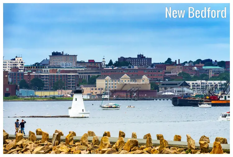Amazing stonework looking over at the white Breakwater Entrance Lighthouse in the New Bedford Harbor, Massachusetts Amazing stonework looking over at the white Breakwater Entrance Lighthouse in the New Bedford Harbor, Massachusetts