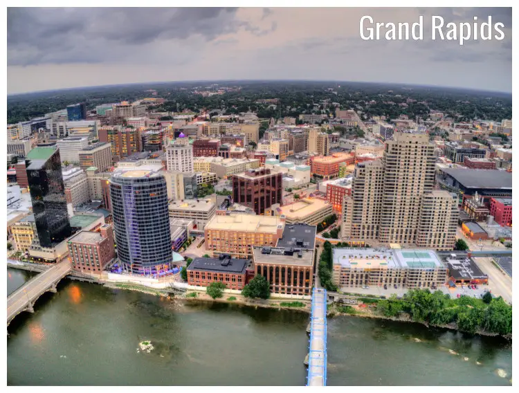 The vast cityscape of Grand Rapids, a moderately large town in Michigan and two visible bridges across the river The vast cityscape of Grand Rapids, a moderately large town in Michigan and two visible bridges across the river