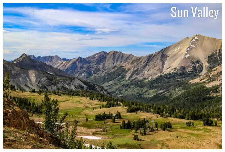 The iconic Sun Valley, Idaho, in a stunning hilly landscape on either side located within the famous White Cloud Wilderness The iconic Sun Valley, Idaho, in a stunning hilly landscape on either side located within the famous White Cloud Wilderness