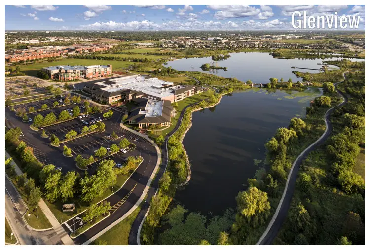 The scenic lake near a famous college and a grade school with an intricate path and road system near Glenview, Illinois