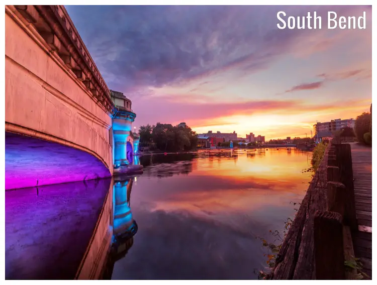 Colorful river lights on the bridge of St. Joseph River in South Bend, Indiana