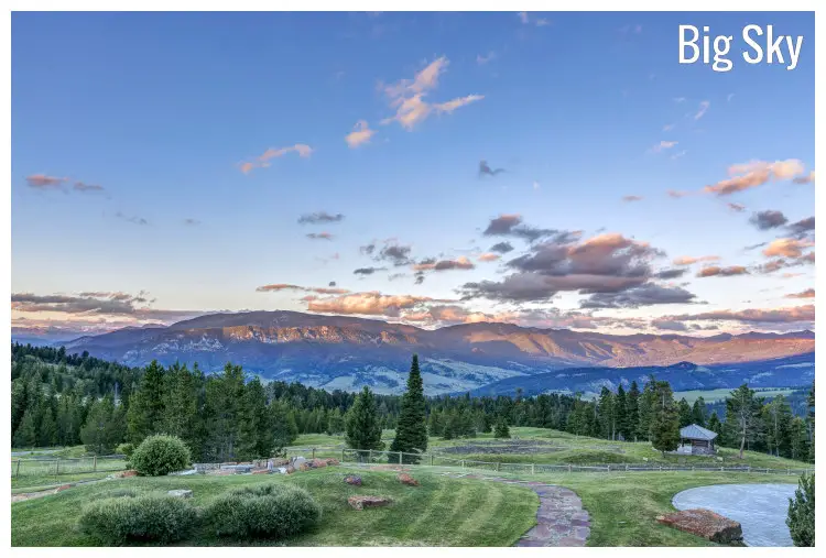 Vast fields and planted forests near the scenic mountainous region in Big Sky, Montana